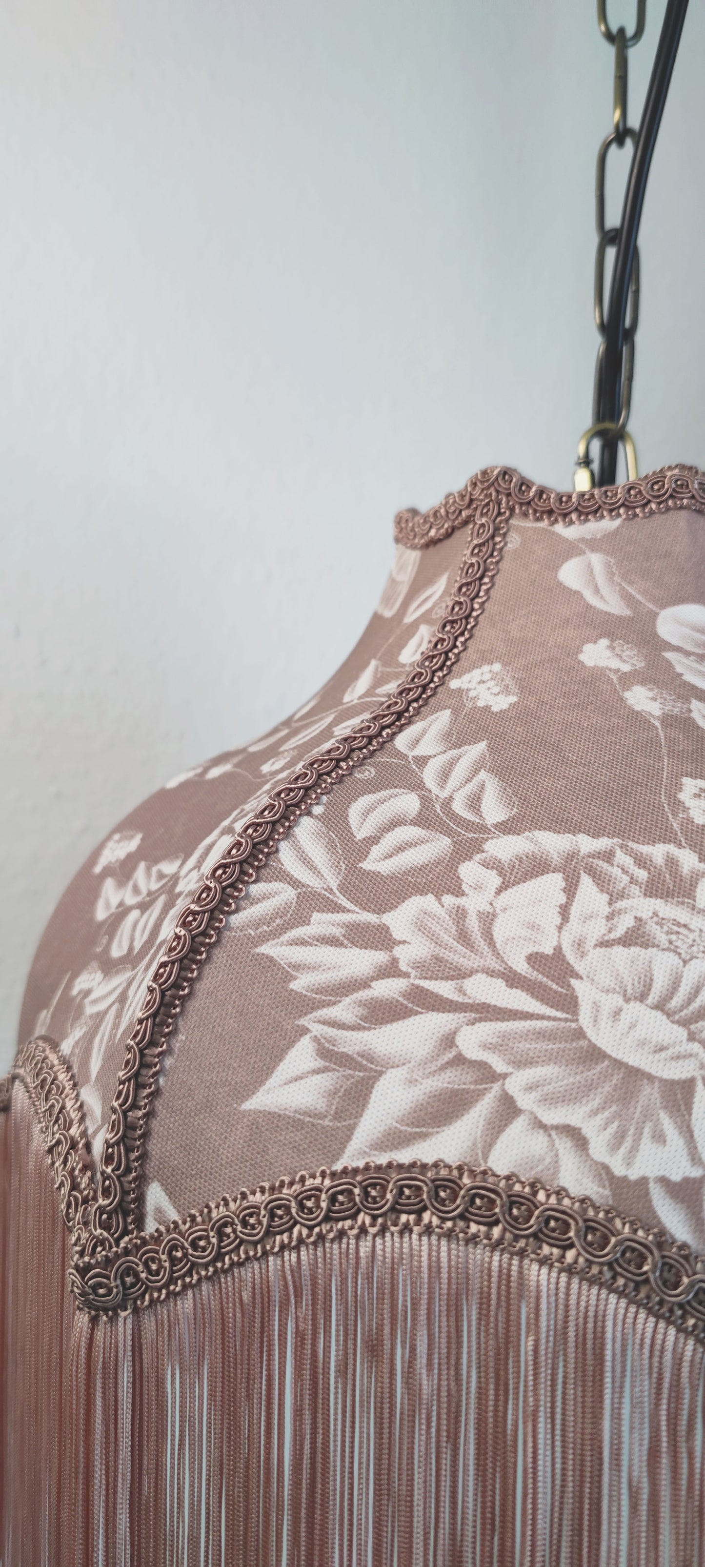 Lampshade with blush fringe and braid trim
