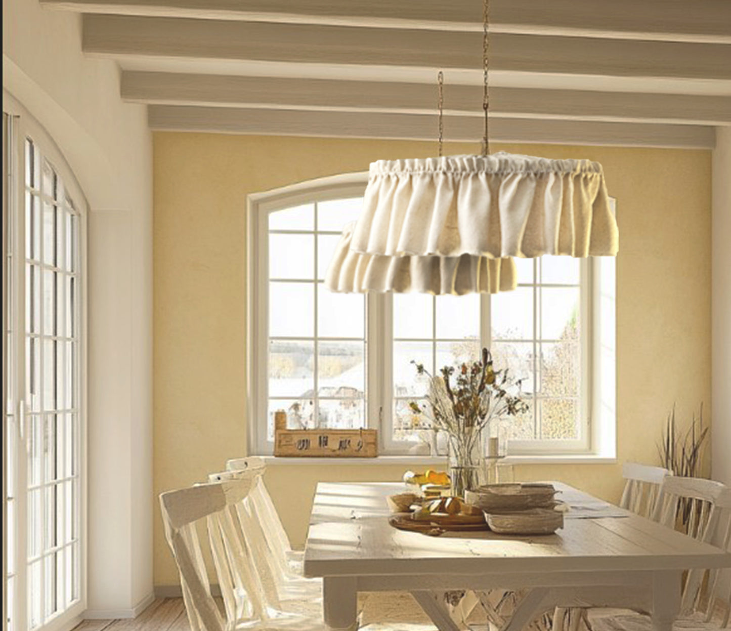 Dining room with a white table and chairs, light fixture lampshades, and window with decorative elements.
