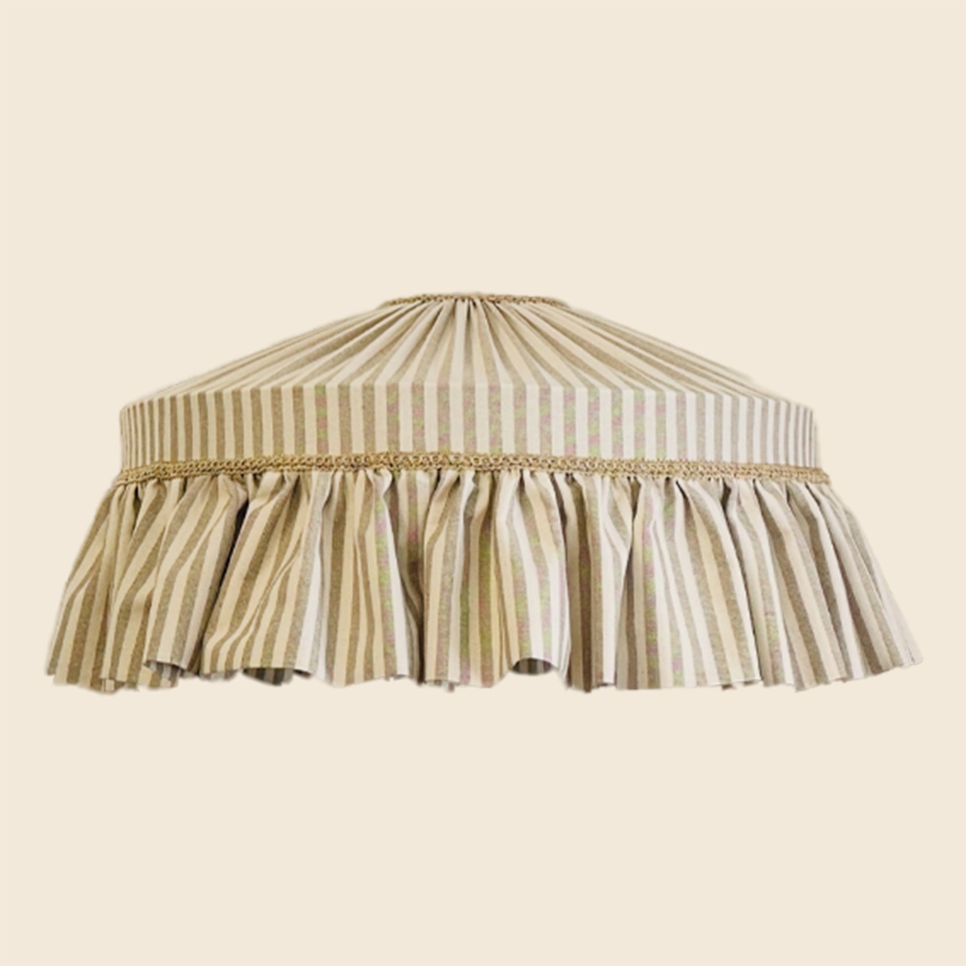 Striped lampshade with ruffled bottom on a beige background