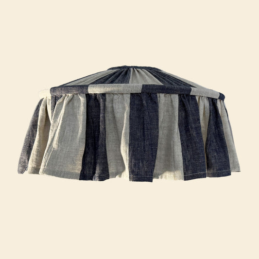 Ruffled Lampshade with blue and gray striped pattern on a beige background